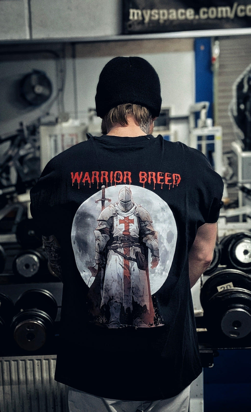 Oversized gym T-shirt featuring a knight graphic from Warrior Breed by Gympop, casual and stylish men's apparel.