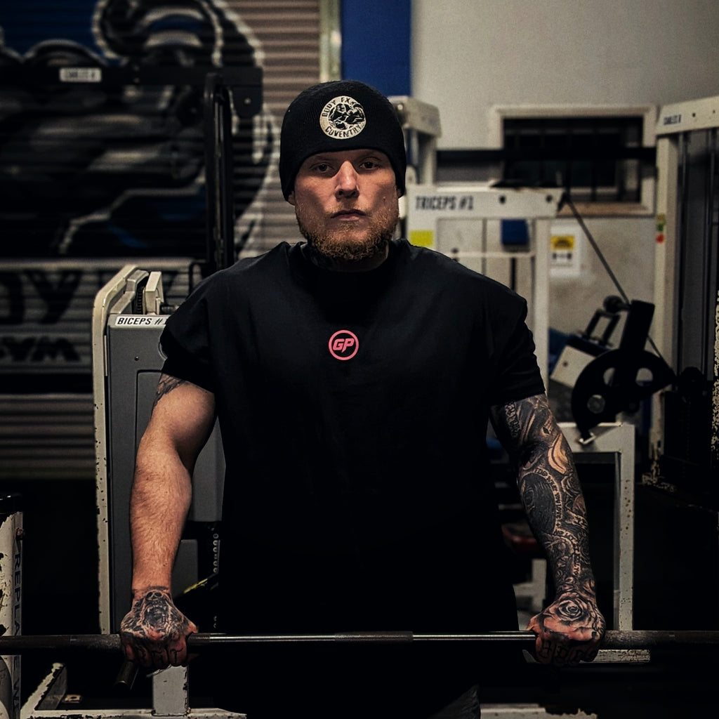 Oversized Warrior Breed Knight T-shirt from Gympop featuring a bold knight graphic on soft fabric in black.