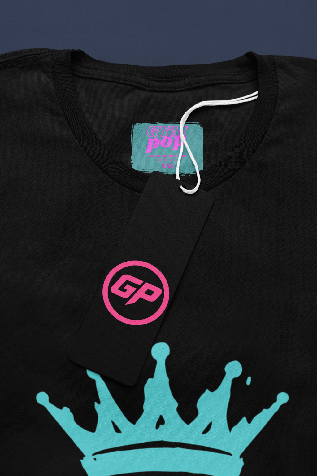 Gympop Graffiti Crown Signature Tee mockup featuring a round-neck t-shirt with a paper tag and graffiti crown design.