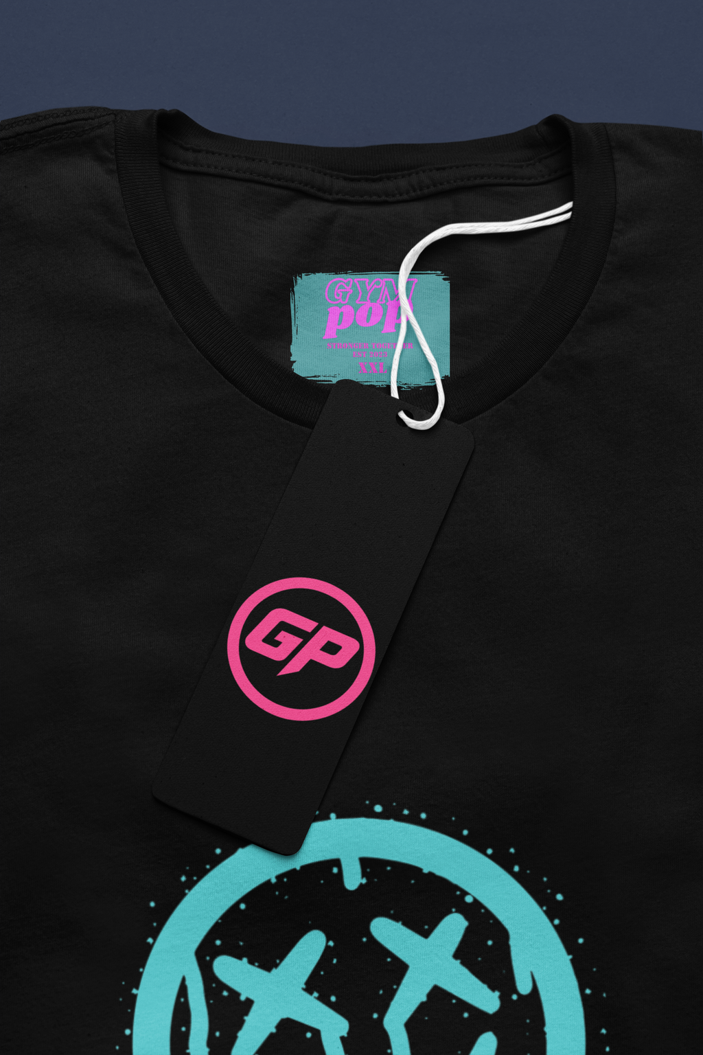 Gray round-neck T-shirt featuring graffiti smiley signature print by Gympop, displayed with a paper tag on a plain background.