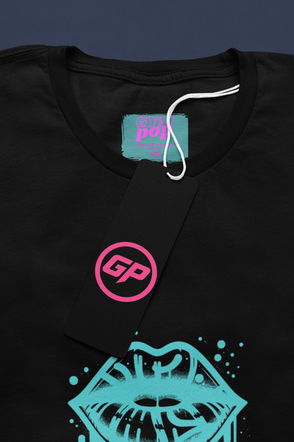 Gympop Graffiti Lips Signature Tee mockup featuring a round-neck T-shirt with a colorful graffiti lip design and paper tag.